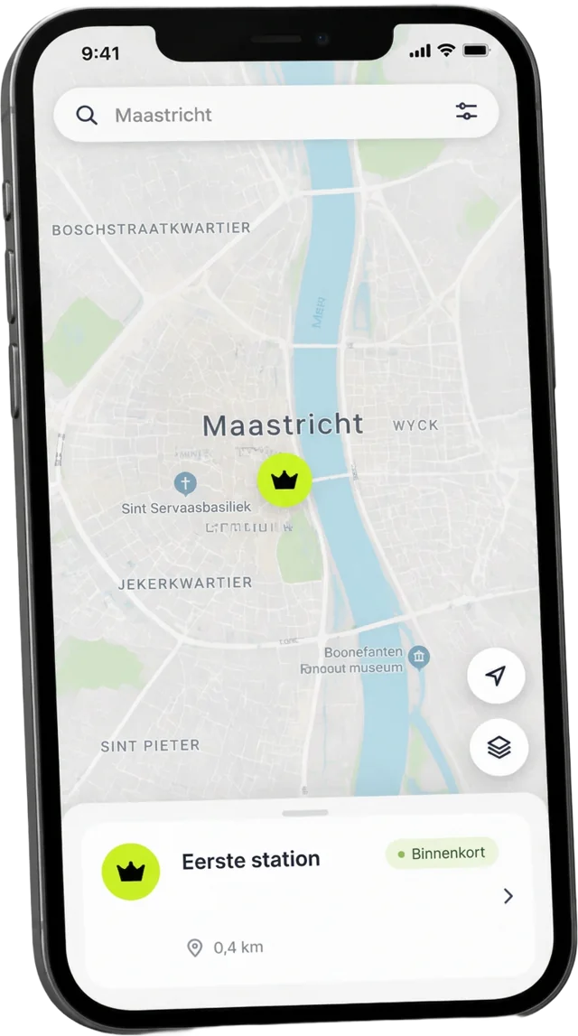 Telefoon met een kaart van Maastricht en een lime marker voor het eerste station
